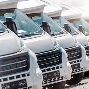 Commercial vans lined up for service