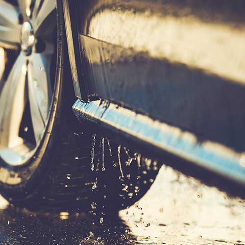 Car leaving the wash tunnel with a clean exterior